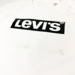 Levi’s Women's Relaxed Fit Graphic Raw Cut Hem Sweatshirt In White - Image 6