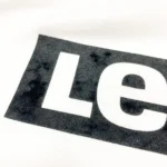 Levi’s Women's Relaxed Fit Graphic Raw Cut Hem Sweatshirt In White - Image 11